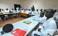 Ivorian police officers listen attentively during a course on managing a crime scene conducted by the United Nations Police (Abidjan, February 2012)