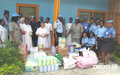 Female UN police officers and their Ivorian counterparts donated food items to the Anges des Soeurs Pauvres children’s home in Adiaké (March 2016)
