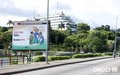 A billboard with a IEC sensitisation poster promoting a peaceful electoral climate in Attecoube neighbourhood (Abidjan, October 2015) 