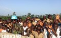 Excited pupils from the secondary modern school in Bayota, which is to benefit from a building project comprising a canteen and six classes, welcome an UNOCI delegation (Bayota, November 2015) 