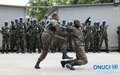 A self-defence exercise was part of the entertainment during a medal parade ceremony for UNOCI’s Togolese Contingent (Abidjan, November 2014)