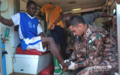 A UNOCI peacekeeper treats an injured sportsman during UN Days organized in Sikensi in March 2012 (Photo ONUCI/ Patricia Estheve)