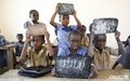  Les élèves de cette école réhabilitée par l'ONUCI, dans le cadre de son programme de Projets à impact rapide, apprennent à écrire la lettre U (Duékoué, avril 2012)